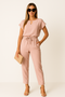 Jumpsuit festif avec détail de noeud