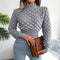 Top doppiopetto in maglia con texture e colore
