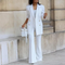 Elegante blazer de mujer con cierre de botones y pantalón acampanado - Conjunto de dos piezas para todas las estaciones
