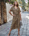 Elegant efterårskjole med leopardprint