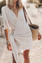 Short wrap dress for women with asymmetrical hem